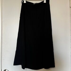 Zara Black Midi Skirt with pleats and belt loops - like new. Purchased in Italy